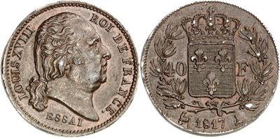 a silver coin with a crown on top of it