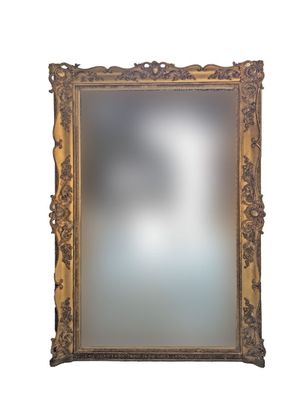 Important miroir en bois stuqué et doré à décor de feuillage…