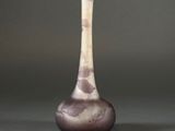 purple and white vase on a grey background