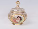 a glass jar with a picture of a woman on it