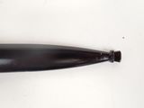 a black baseball bat laying on a white surface
