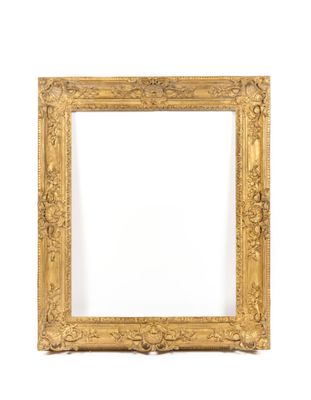 a gold frame with a white background and a white wall