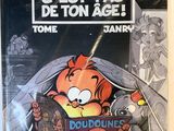 the cover of a comic book with an image of a cat holding a gun