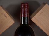 a bottle of wine that is sitting on a table