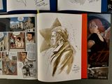 a book with a drawing of a man and a woman