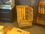 a display of breads and pastries in a store