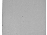 a piece of gray paper with a white label on it