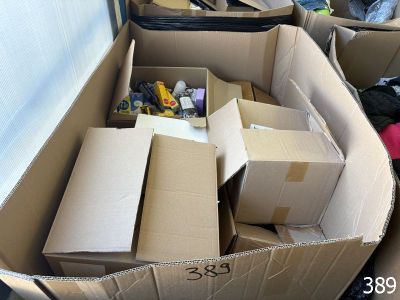 many boxes that are sitting in the back of a truck