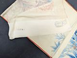a folded piece of cloth with a picture of a woman on it