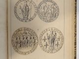 an open book with a drawing of a group of people on it