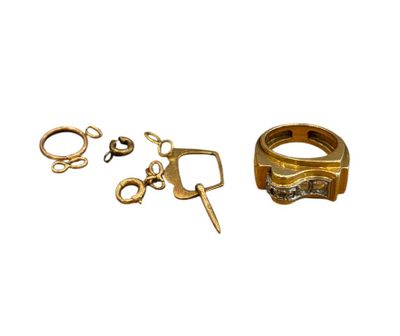 a pair of scissors and a pair of rings on a white background
