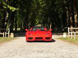 a red sports car parked on the side of the road