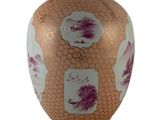 a vase that has purple and white designs on it