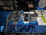 a table with a bunch of electronics on it