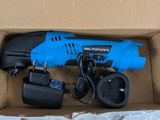 a box with tools and a football inside of it