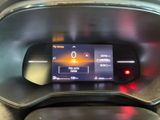 the dashboard of a car with a digital display on it