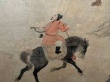 a painting of a man riding a horse on the wall