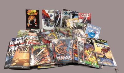 a lot of comic books that are on the table