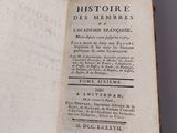 an open book with a black and white title on it