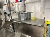 a sink and a faucet in the kitchen