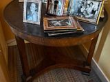 a table with a bunch of pictures on top of it