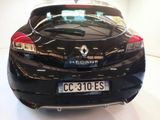 a black car that is parked in a showroom