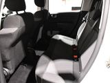 a picture of the inside of a car with the back seats down