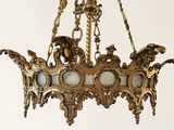 a chandelier hanging from the ceiling in a room
