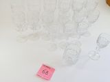 a lot of empty wine glasses on the table