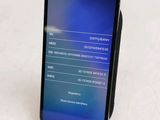 the back of an iphone with the display on it ' s side