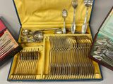 a box with silverware in it on a table