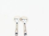 pair of silver plated earrings on a white background