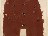 une image représentant un morceau de papier marron percé de trous