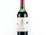 a bottle of wine that is sitting on a table