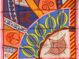 an image of a square scarf with a colorful design on it