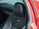 a red car with black seats in the back of it