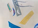 a drawing of a clock, ruler, and other items on a piece of paper