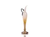 a glass vase with a black handle on a white background