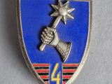 a close up of a badge with a hand holding a star