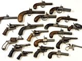 a lot of old guns that are on the table