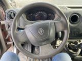 dashboard of a car with a steering wheel and dashboard controls