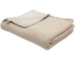 an image of a blanket folded up on a white background
