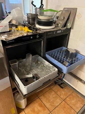 a small kitchen with a dishwasher and a dishwasher