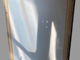 a picture of a picture of a shadow of a person on a mirror