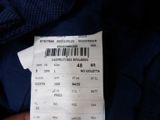 a close up of a person ' s hand holding a ticket