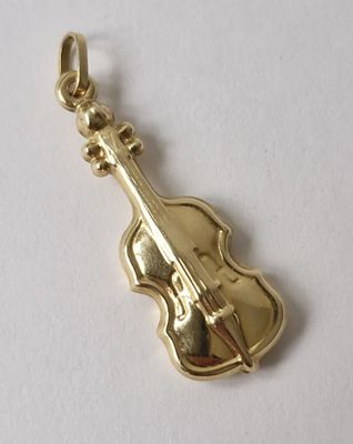 Petit pendentif en or jaune 750/°° représentant un violon au…
