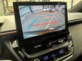 a picture of a car dashboard with a monitor on it