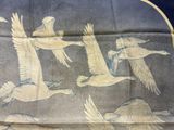 a lot of birds that are flying in the sky