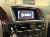 a picture of a car dashboard with a digital screen