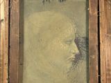 tableau représentant un homme barbu, dans un cadre en bois